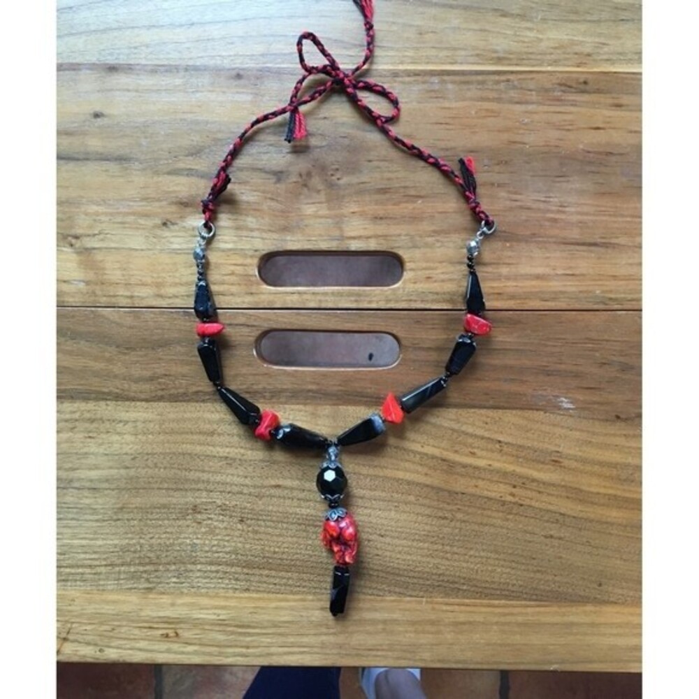 Vintage boho red houlite and black beads necklace length 22" and 3.5" pendant.